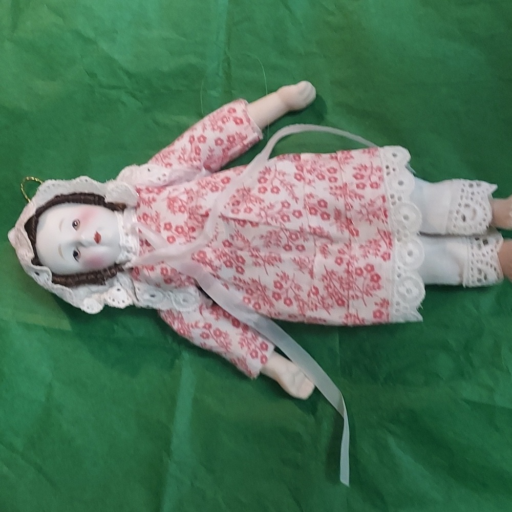 Bisque Face  Doll hand painted porcelaine 1960s soft cloth body.